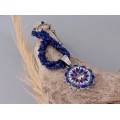 Colier etnic amerindian din argint decorat cu lapis lazuli, coral și sidef natural | amuletă Zuni Pueblo Sun Face | atelier R P Edaakie | Statele Unite cca.1980 