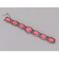 Brățară Art Deco din argint decorată cu spectaculoase anturaje sticlă roz chatoiantă și incrustații de marcasite | cca.1935 