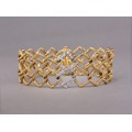 Brățară  Tiffany & Co. designer Paloma Picasso manufacturată în aur 18K și diamante montate în platină | 1982