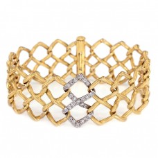 Brățară  Tiffany & Co. designer Paloma Picasso manufacturată în aur 18K și diamante montate în platină | 1982 Brățară  Tiffany & Co. designer Paloma Picasso manufacturată în aur 18K și diamante montate în platină | 1982