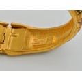 Brățară Yves Saint Laurent | oțel texturat & placat cu aur galben | New Old Stock | Franța cca.1985