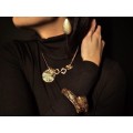 Demi-parure de bijuterii Yves Saint Laurent compus din brățară și colier | Franța anii '80