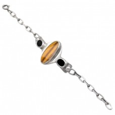 Brățară unisex modernistă de perioadă mid-century din argint decorată cu ochi de tigru și onix negru  Brățară unisex modernistă de perioadă mid-century din argint decorată cu ochi de tigru și onix negru