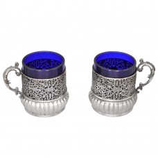 Garnitură tete a tete pentru ceai și cafea format din 2 cești din argint și sticlă cobalt | atelier Ganci Argenterie - Milano cca. 1945 Garnitură tete a tete pentru ceai și cafea format din 2 cești din argint și sticlă cobalt | atelier Ganci Argenterie - Milano cca. 1945