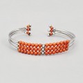 Brățară cuff din argint decorată cu anturaje de coral roșu natural | atelier napoletan cca. 1970
