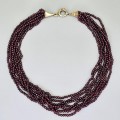 Colier multi-strand de granate rodolit cu închidere din argint aurit stilizată în manieră Etruscan Revival 