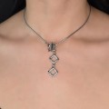 Colier Yves Saint Laurent cu pandant retromodernist | metal placat cu rodiu & cristal Swarovski | Franța cca.1985