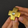 Broșă - pandant cruciform Yves Saint Laurent | metal placat cu aur & perle faux | New Old Stock