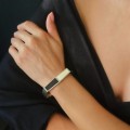 Brățară bangle mid-century manufacturată în argint decorată cu lemn de abanos și fildeș | Statele Unite cca.1970