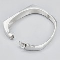Brățară bangle mid-century manufacturată în argint decorată cu lemn de abanos și fildeș | Statele Unite cca.1970