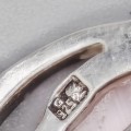 Brățară modernistă din argint decorată cu anturaje de cuarț sintetic " ochi de pisică "  | preloved