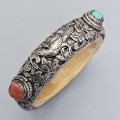 Veche brățară ritualică sino - tibetană din argint, os, coral și turcoaz natural  | Nepal cca 1900