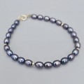 Brățară cu perle negre naturale de cultură și aur galben 18k