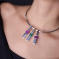 Colier choker modernist din argint cu trei pandantive interșanjabile decorate cu rubine și smarald natural