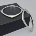 Set format din două brățări bangle design contemporan din argint amplu volumizat | Italia