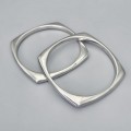 Set format din două brățări bangle design contemporan din argint amplu volumizat | Italia