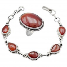 Set de bijuterii manufacturate în argint, decorate cu remarcabile anturaje de carneol natural
