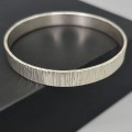 Brățară bangle manufacturată în argint masiv texturat prin reticulare | cca. 1960 - 1970