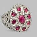 Inel statement manufacturat în argint decorat cu anturaje de rubin natural | India