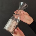 Decantor pentru vin din sticlă și montură din argint împletit | atelier florentin cca. 1970