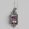 Colier din argint accesorizat cu un elegant pandant în manieră Art Deco, decorat cu rubine, smaralde, safire și incrustații de marcasite | new old stock 