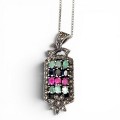 Colier din argint accesorizat cu un elegant pandant în manieră Art Deco, decorat cu rubine, smaralde, safire și incrustații de marcasite | new old stock 