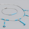 Rafinat set de bijuterii Navajo Liquid Silver manufacturat în argint cu turcoaze naturale | Statele Unite cca. 1970 - 1980