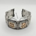 Veche brățară statement „ Rhodos Heritage ”, manufacturată în argint, decorată cu marcasite și panouri laminate cu aur rosé | Grecia - atelier Rhodos | cca. 1920 - 1930