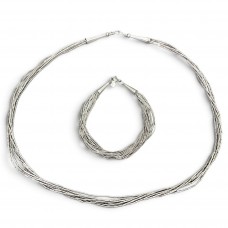 Set de bijuterii etnice Navajo Liquid Silver din argint sterling, compus din colier și brățară | Statele Unite cca. 1970 - 1990