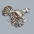 Remarcabilă broșă bavareză de inspirație cinegetică Charivari, reprezentând un cocoș de munte, manufacturată în argint masiv, cu penaj decorat cu incrustații policrome de jasp natural și ochi din granat natural Germania / Austria | cca. 1910 - 1930