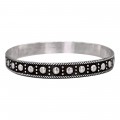 Veche brățară magrebiană, tip bangle, manufacturată în argint, cu decor tradițional în relief și patină naturală | Maroc - perioada Protectoratului Francez | cca. 1930