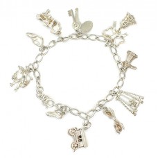 Brățară vintage din argint accesorizată cu charmuri porte-bonheur realizate manual | Marea Britanie | anii '70 Brățară vintage din argint accesorizată cu charmuri porte-bonheur realizate manual | Marea Britanie | anii '70