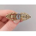 Broșă edwardiană decorată cu topaz albastru acvamarin | metal laminat cu aur | cca. 1920