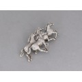 Broșă americană din argint stilizată sub forma unui grup de cai mustang | Statele Unite cca. 1970