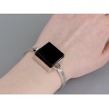 Brățară bangle retromodernistă din argint decorată cu anturaj de plexiglass negru | Franța cca.1980