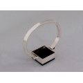 Brățară bangle retromodernistă din argint decorată cu anturaj de plexiglass negru | Franța cca.1980